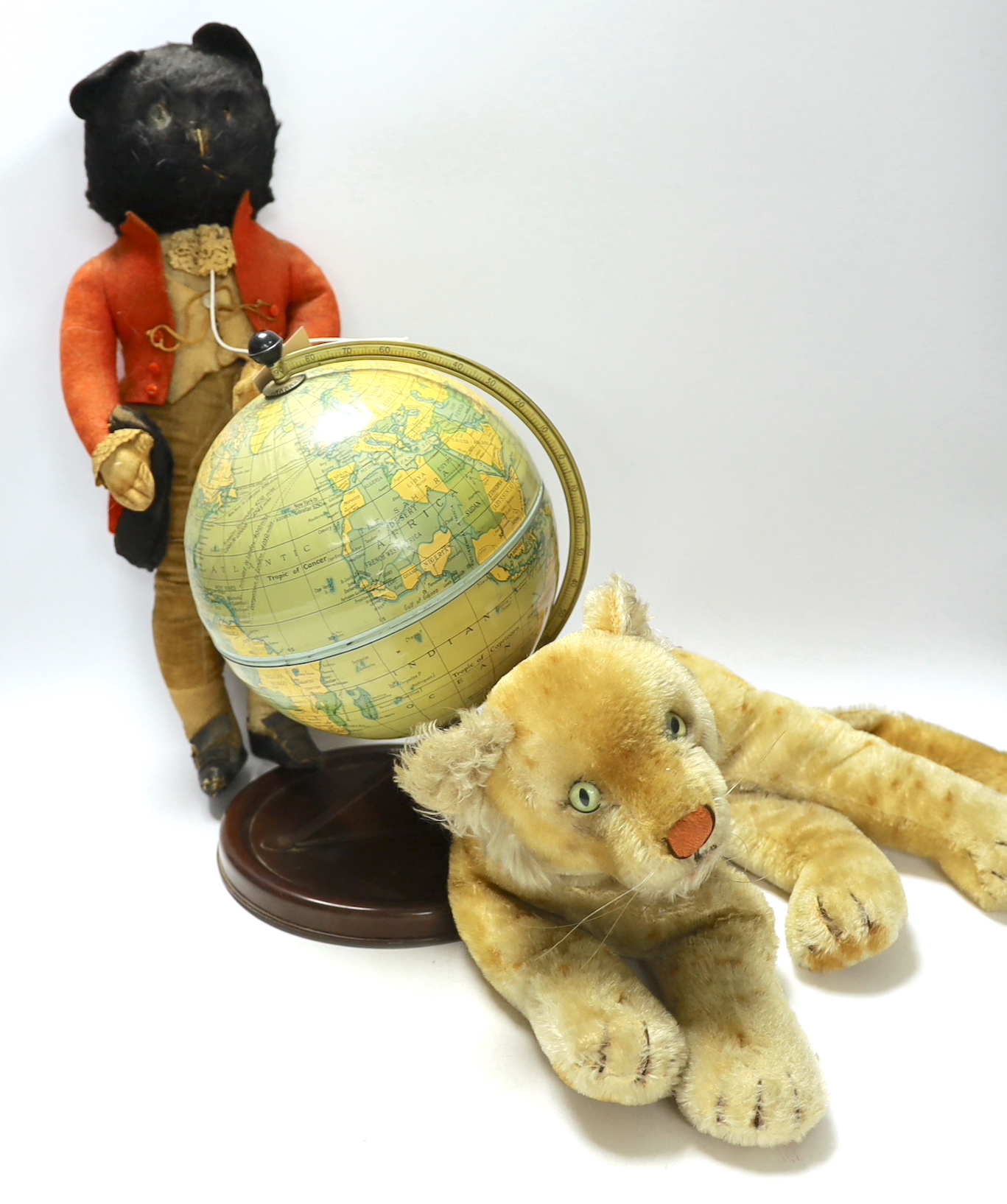 Tinplate globe and two soft toys